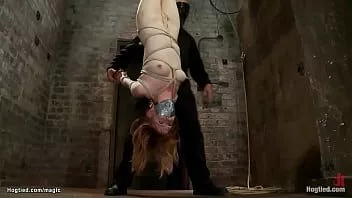 Play Slave suspended for ankles and spanked